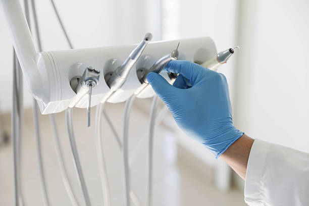 Professional Tooth Extraction technician working in Park City, IL